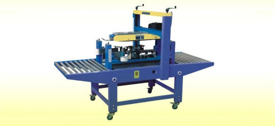 Adhesive tape carton sealer for side sealing